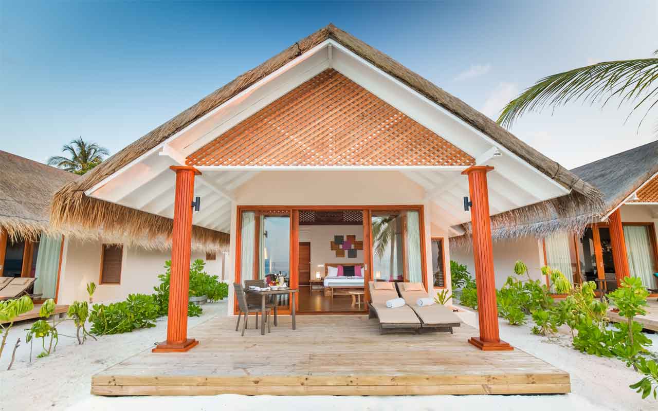 Kudafushi_Resort_and_Spa_Malediven_Flitterwochen_Beach_Villa_1
