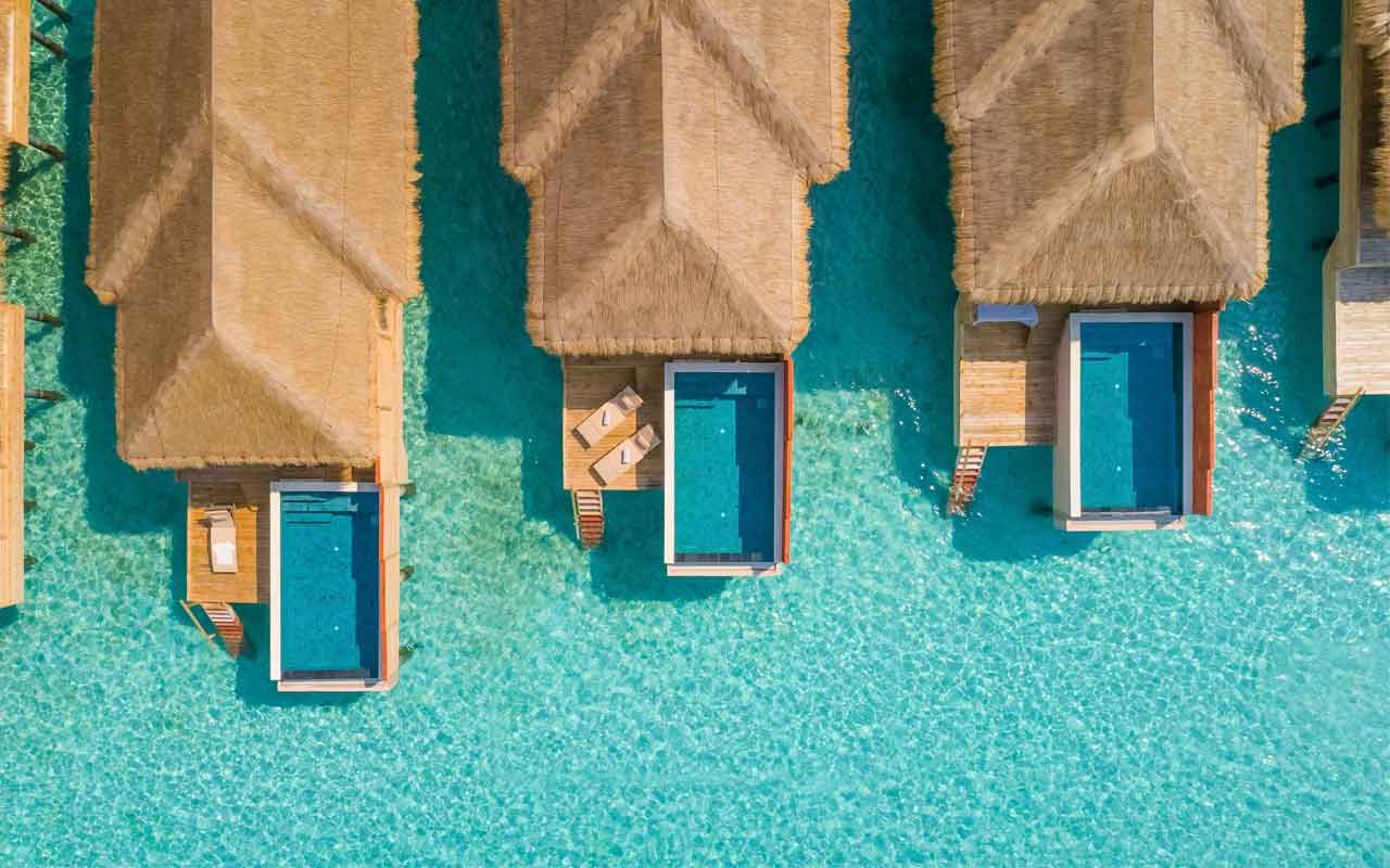 Kudafushi_Resort_and_Spa_Malediven_Flitterwochen_Water_Villa_with_Pool_1