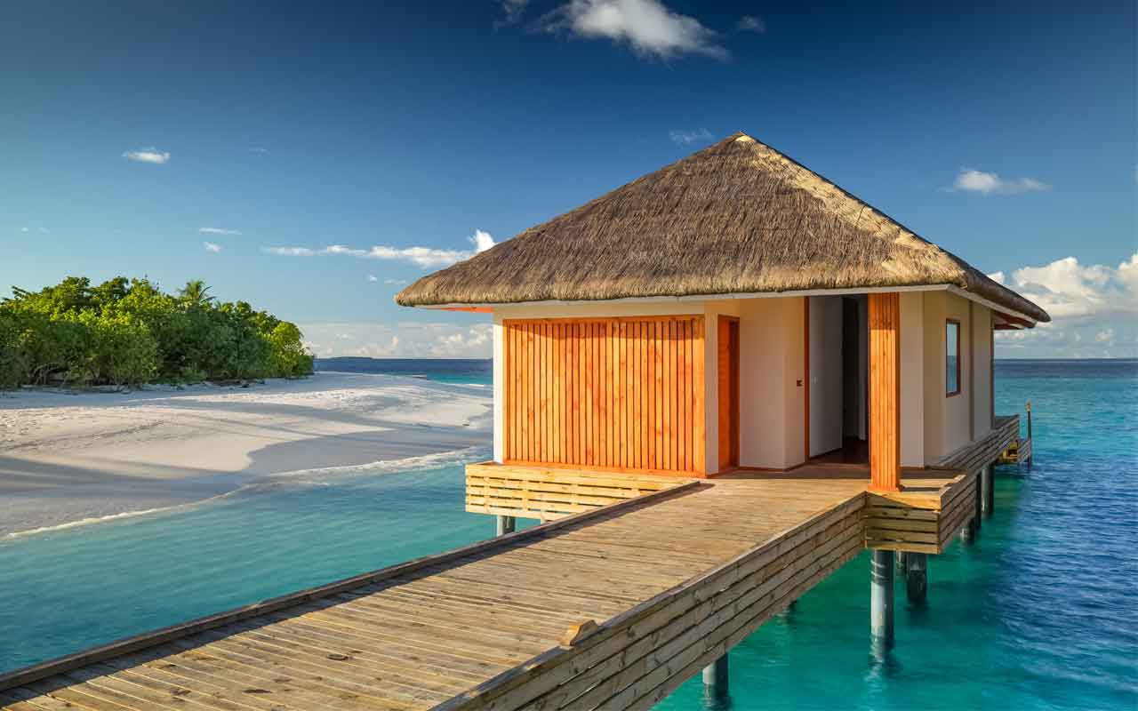 Kudafushi_Resort_and_Spa_Malediven_Flitterwochen_Water_Villa_with_Pool_2