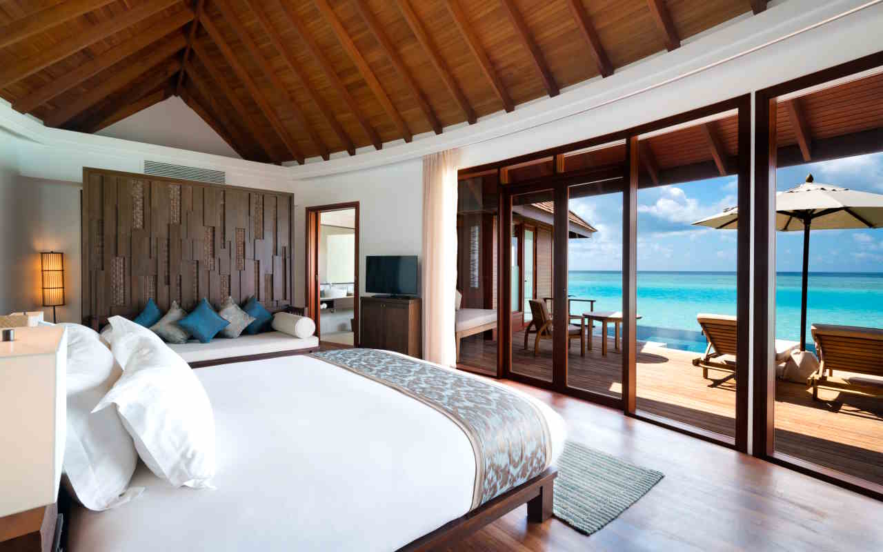 Anantara_Dhigu_Maldives_Resort_Guest_Room_Over_Water_Pool_Suite_Bedroom_with_Deck